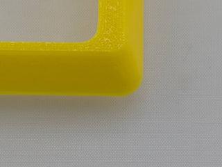 Yellow Alpine CD radio replacement bezel trim ring front product view