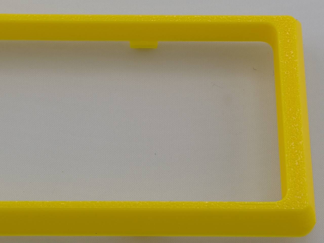 Yellow Alpine CD radio replacement bezel trim ring side profile