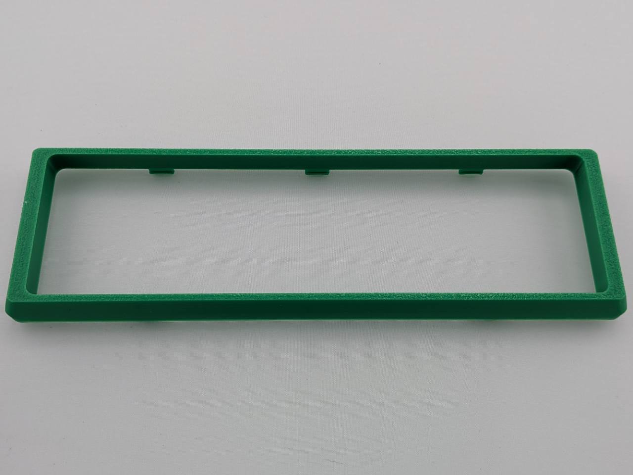 Green Alpine CD radio replacement bezel trim ring clip detail