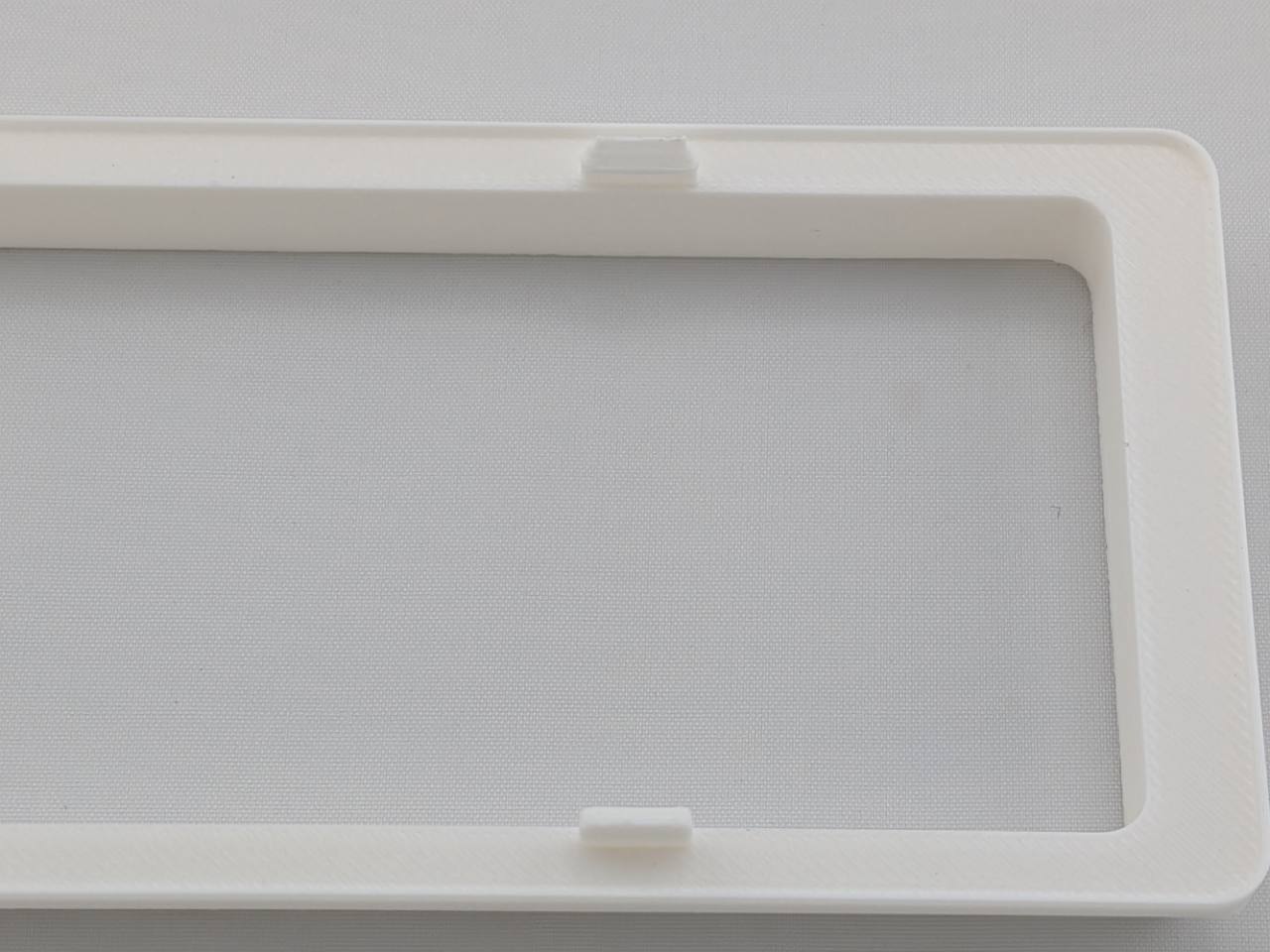 White Alpine CD radio replacement bezel trim ring angled product view