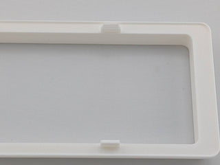 White Alpine CD radio replacement bezel trim ring angled product view