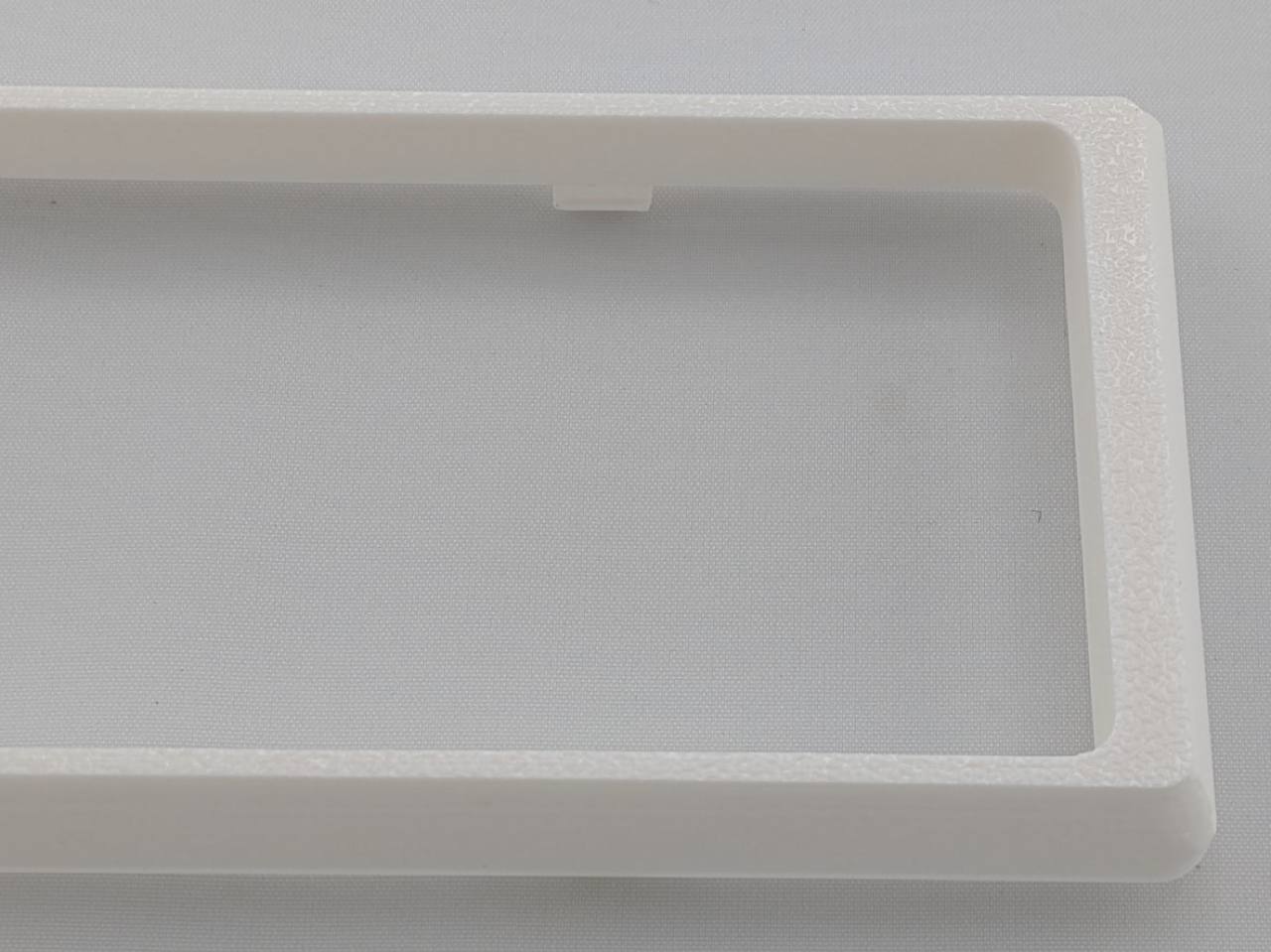 White Alpine CD radio replacement bezel trim ring corner detail