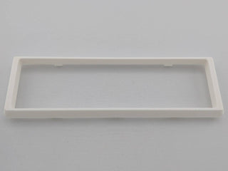White Alpine CD radio replacement bezel trim ring mounting tab close-up