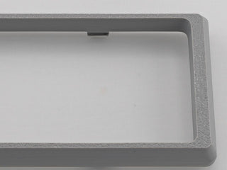 Gray Alpine CD radio replacement bezel trim ring corner and texture detail