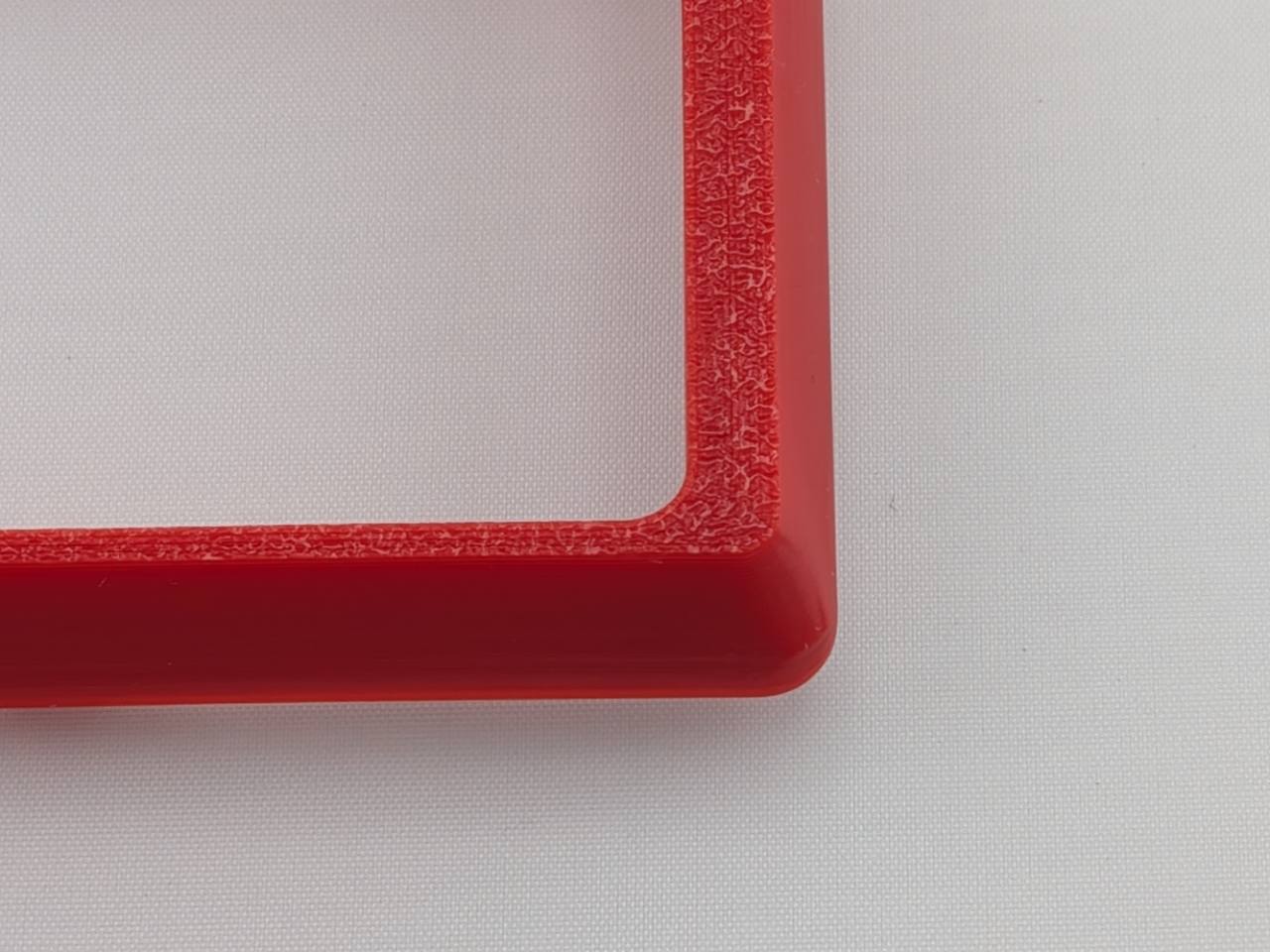 Red Alpine CD radio replacement bezel trim ring angled product view