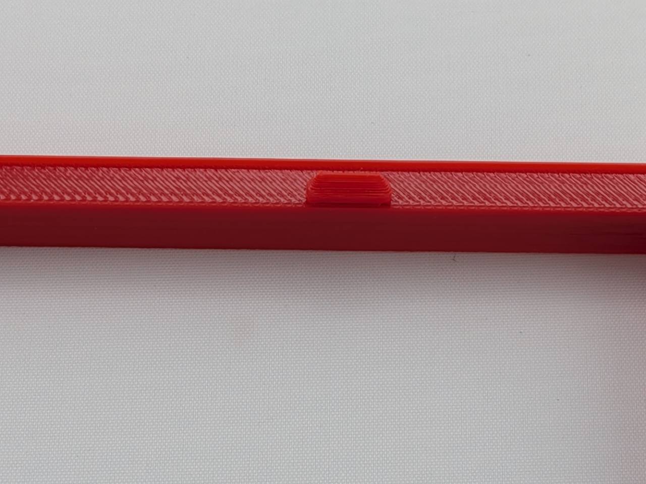 Red Alpine CD radio replacement bezel trim ring corner detail