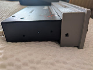 Precision Power PPI E-7 1 DIN one-piece faceplate bezel right side depth view on PPI E-7
