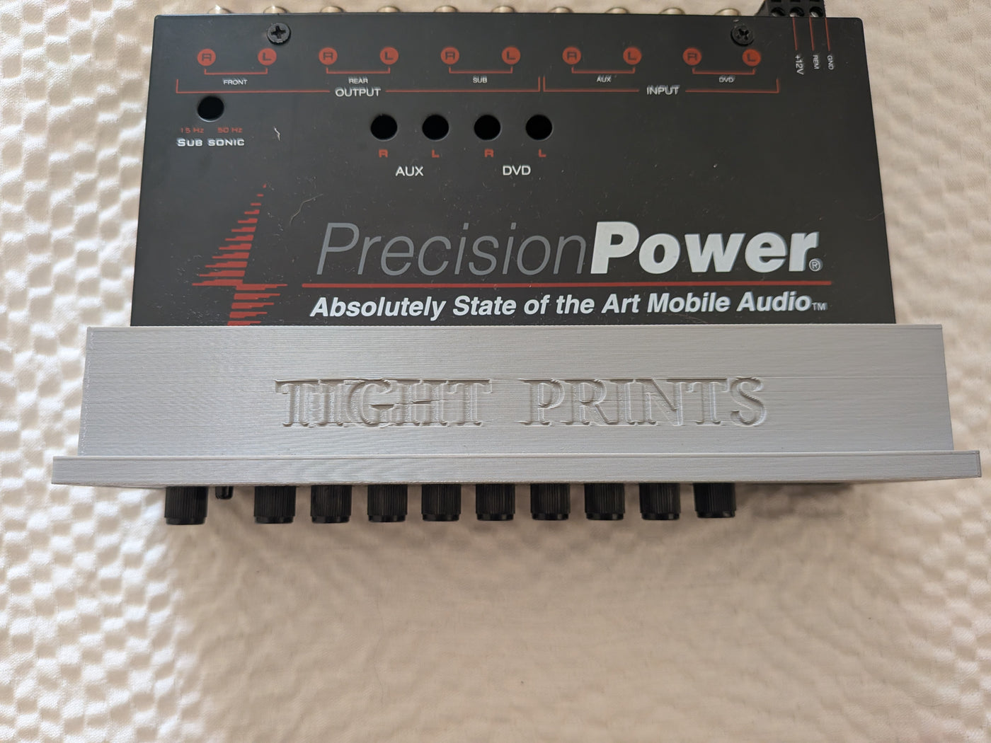 Precision Power PPI E-7 1 DIN one-piece faceplate bezel top view on Precision Power PPI E-7
