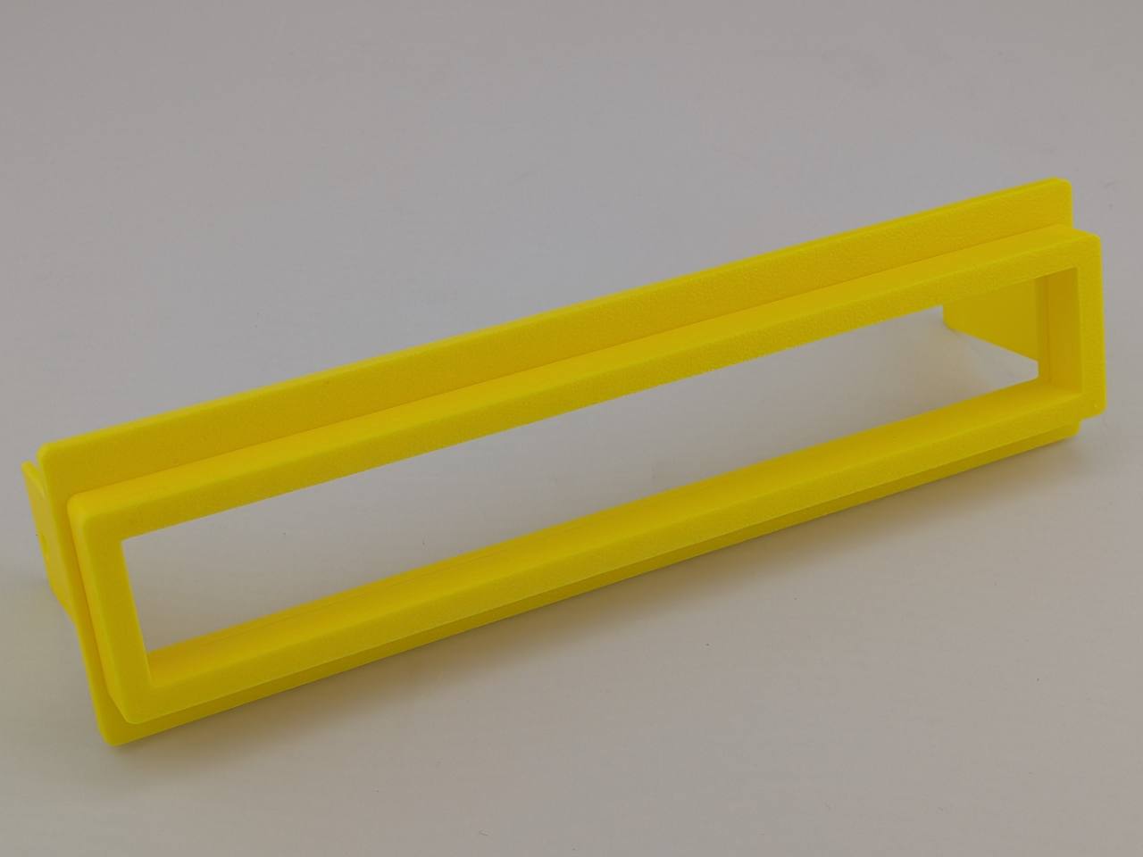 Yellow TightPrints two-piece replacement faceplate and fitment-based bezel set for Alpine ERE-G180, G-180, 3318, 3331, and 3321, angled front view