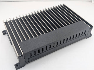 Black replacement cover and mounting feet shown installed on a compatible Kicker amplifier; amplifier not included