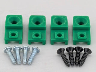 Green TightPrints replacement amplifier mounting feet kit for compatible Kicker Stillwater Designs amplifiers, showing four feet and eight included screws