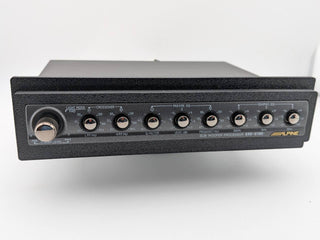 Black TightPrints replacement faceplate and bezel fitted to an Alpine ERE-G190, full front view; equalizer shown for fitment only and not included