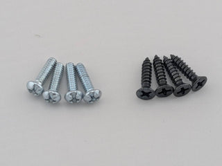 Four silver amplifier-attachment screws and four black mounting-surface screws included with the TightPrints mounting-feet kit