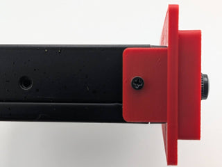 Red Kicker KQ9 replacement faceplate and bezel installed, side mounting-fit close-up; equalizer not included