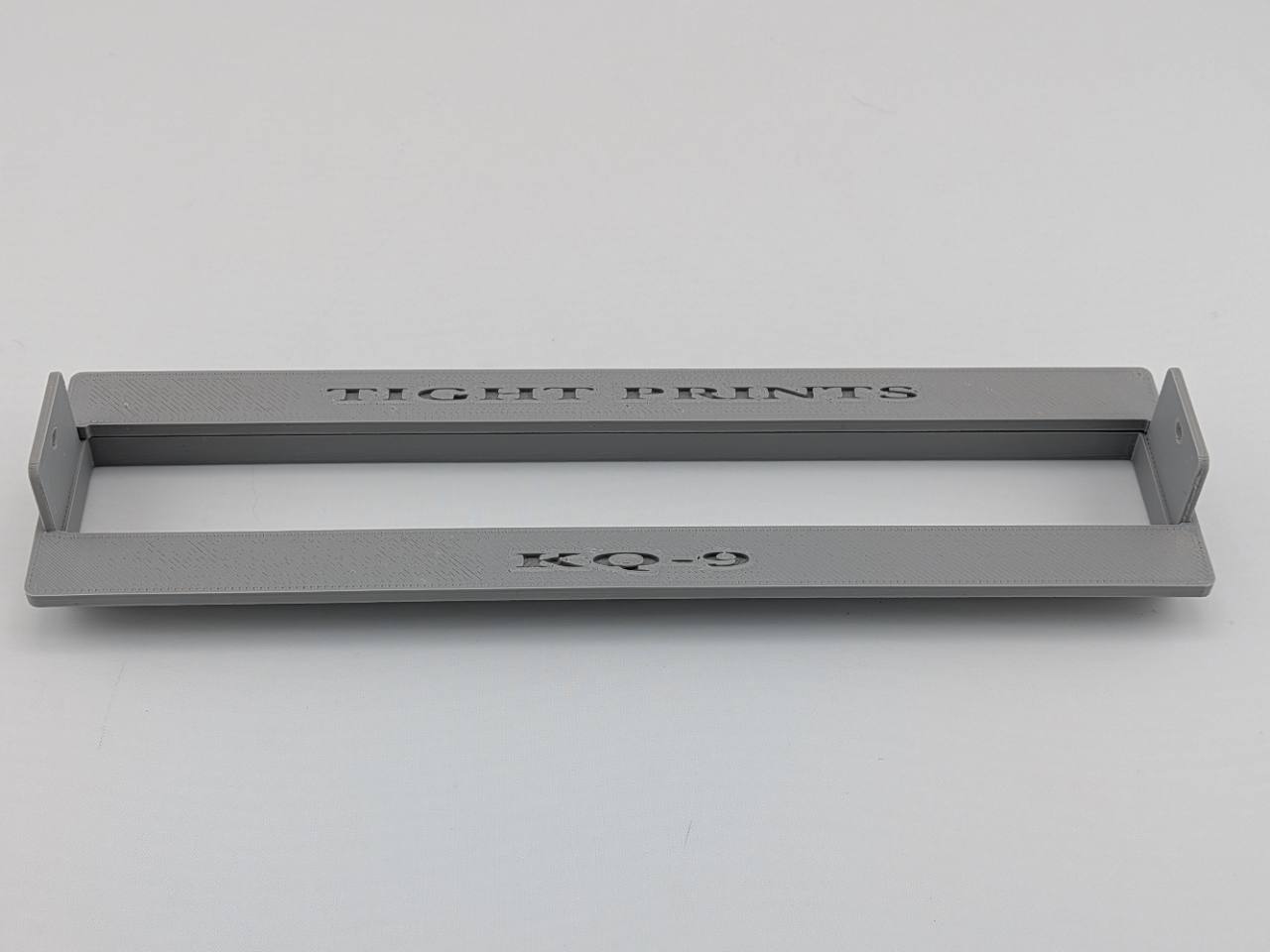Gray Kicker KQ9 replacement faceplate and bezel set, straight reference view