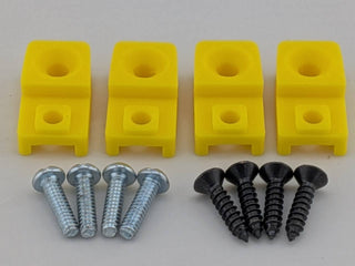 Yellow TightPrints replacement amplifier mounting feet kit for compatible Kicker Stillwater Designs amplifiers, showing four feet and eight included screws