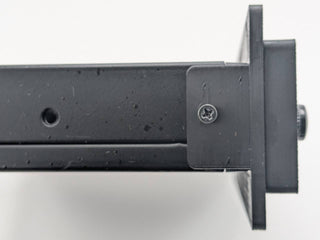 Black Kicker KQ9 replacement faceplate and bezel installed, side mounting-fit close-up; equalizer not included