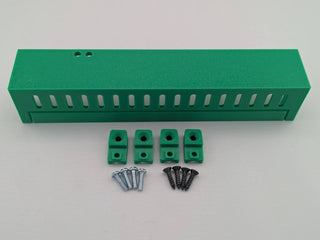 Green Kicker amplifier cover mounting feet kit with four silver screws and four black screws