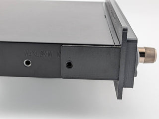 Close right-side fitment view of the Black TightPrints faceplate and bezel on an Alpine ERE-G190; equalizer shown for fitment only and not included