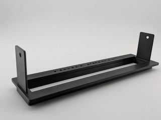 Angled product-only view of the Black TightPrints two-piece replacement faceplate and bezel set for the Alpine ERE-G190