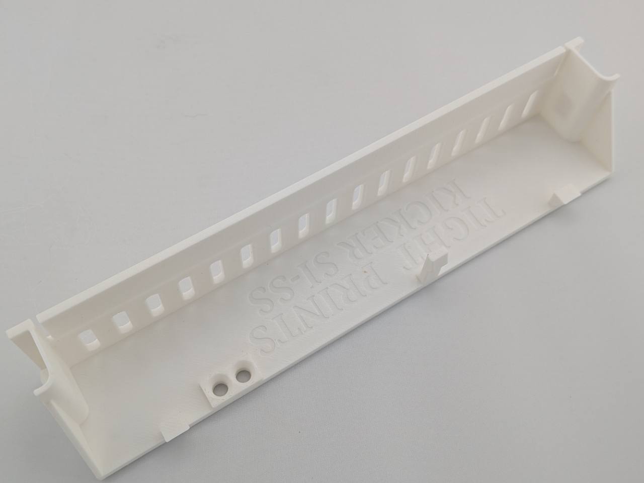 White Kicker amplifier terminal cover interior and mounting detail