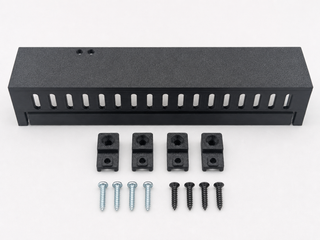 Aligned front view of Black Kicker amplifier cover mounting feet kit with four silver screws and four black screws