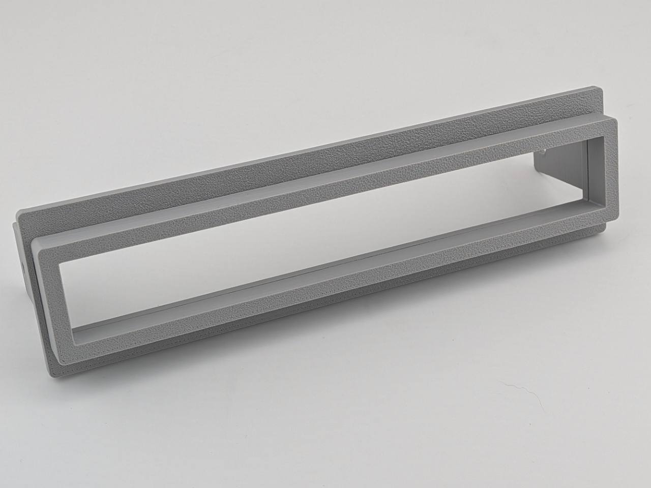 Gray TightPrints two-piece replacement faceplate and fitment-based bezel set for Alpine ERE-G180, G-180, 3318, 3331, and 3321, angled front view