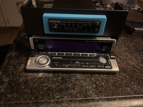 Customer photo of a blue TightPrints trim installed around a Kenwood equalizer