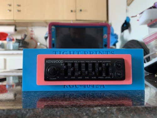Customer photo of a red and blue TightPrints faceplate trim around a Kenwood equalizer