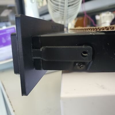 Customer photo showing the rear side and support tab of a TightPrints replacement trim part